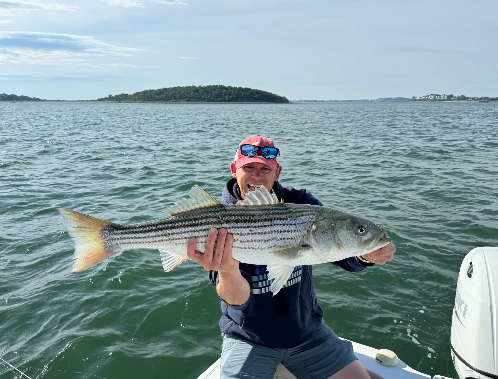 Rob with a striped bass on Boston Harbor